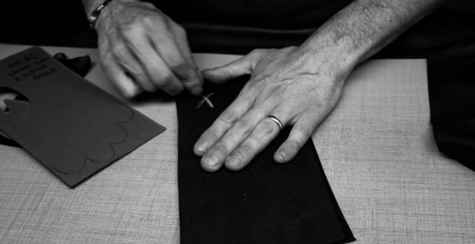 artisan cutting italian leather gloves