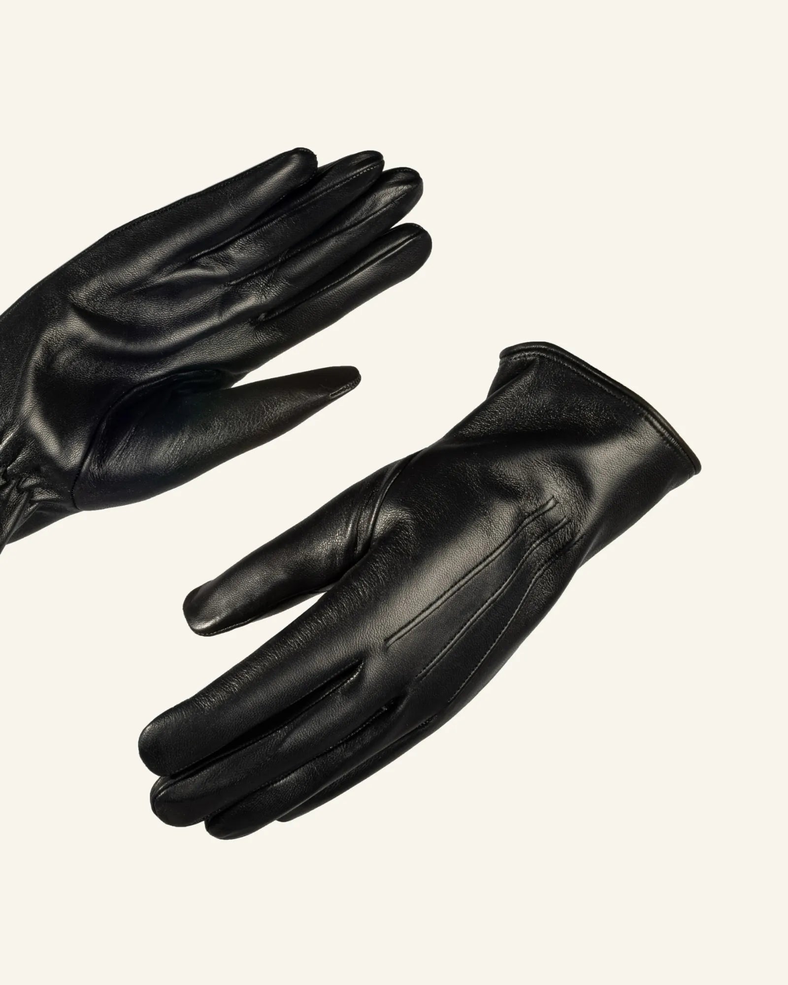 Men's black leather gloves with fur lining detail